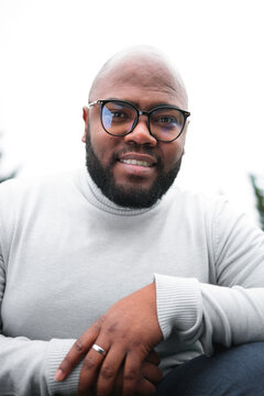 Portrait of Smiling Man in Glasses Outdoors