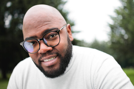 Close-Up of Smiling Man in Looking at Camera