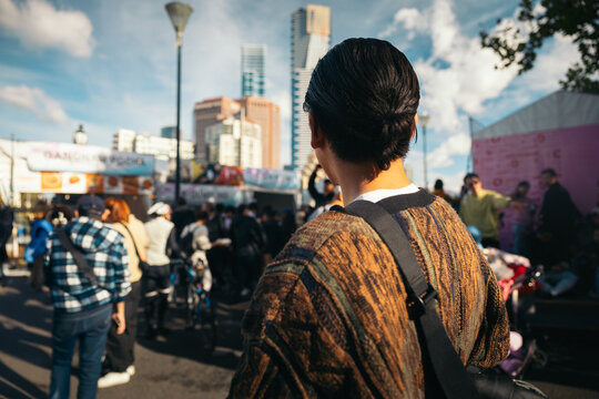 Man at a Busy Street Market in Federation Square