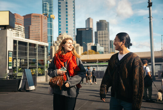 Friends Laughing and Talking in Federation Square