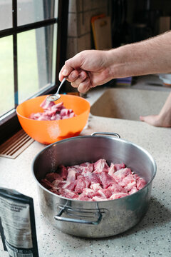 Preparing Flavorful Meat for a Hearty Meal at Home