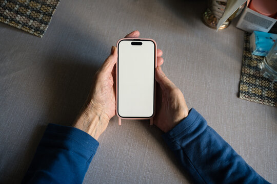 Phone in senior hands