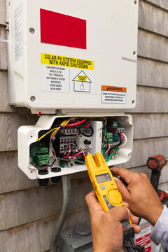 Home Solar Panel electronics tested with multimeter 