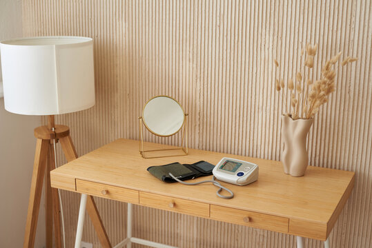 Health monitoring equipment displayed on a wooden table