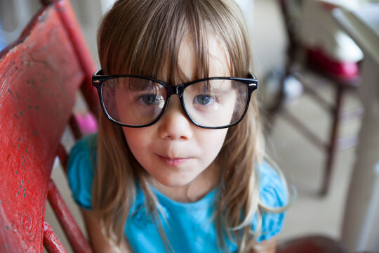 Little girl in large glasses