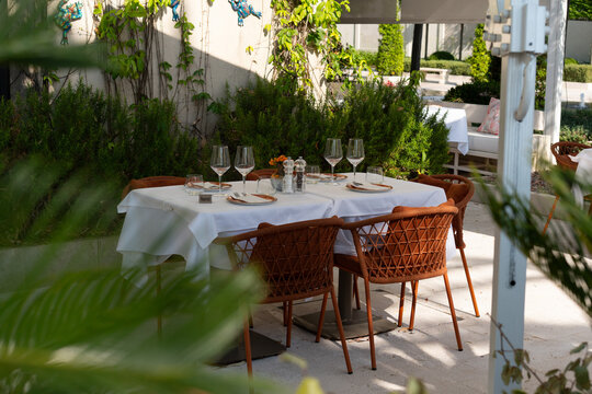 Reserved Outdoor Dining Table with Plants
