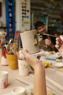 Ceramist students at pottery studio