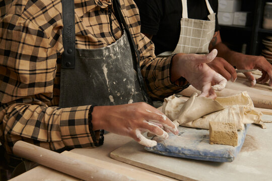 Ceramist students at pottery studio