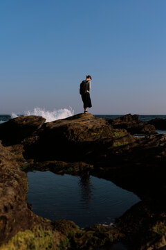 Woman Facing the Waves.