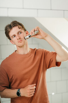 A man shaves