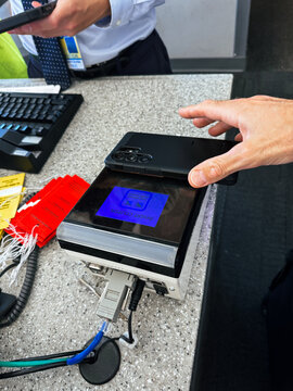 Scanning Boarding Pass in Airport