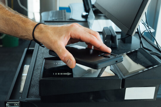 Person Scanning Boarding Pass