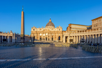 St Peter's basilica and Egyptian obelisk on St Peter's square in Vatican, Rome, Italy (translation "In honor of prince of Apostles; Paul V Borghese, Pope, in year 1612 and 7th year of pontificate)
