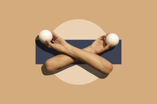 Collage art with a male hands holding foam balls