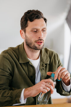 A man with a bottle of water