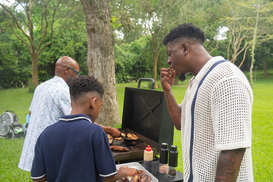 Enjoying food together around the grill