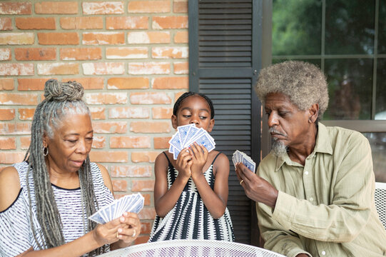 Competitive card game at home with the grandparents 
