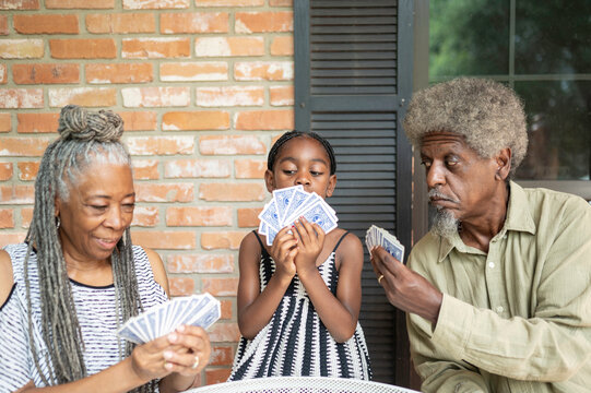 We like to play cards on the porch
