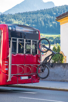 Public Transport Bus with Front-Mounted Bicycle Rack Carrying a Bike in Innsbruck, Austria