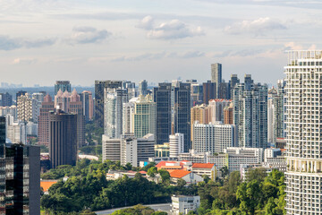 Fototapeta premium Modern business district skyline with steel and glass structures rising above the dense metropolitan landscape in the Republic of Singapore
