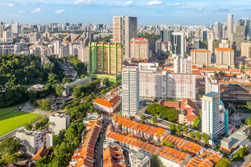 Obraz premium Cityscape of Singapore city showing residential quarter with red roof houses and high rise housing blocks