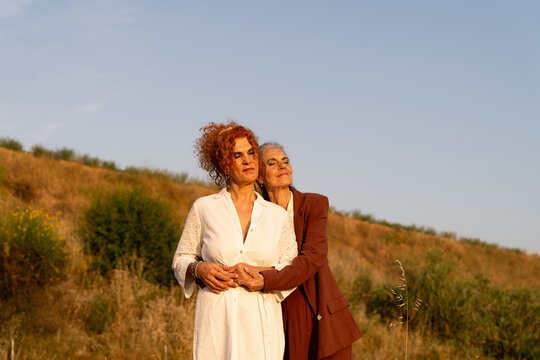 Embrace in open field