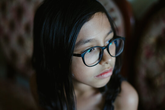Young girl thinking about something