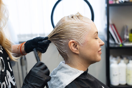 Close-up Portrait Of A Woman Sitting In A Beauty Salon