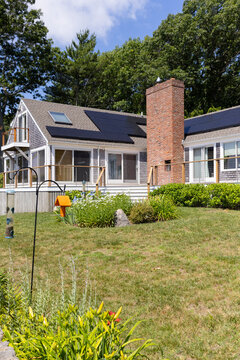 Solar Panel on roof of Single family home on lawn  