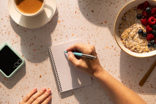 Taking notes while having breakfast