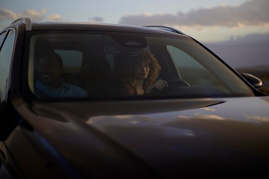 Evening Drive Through Scenic Landscape With Friends