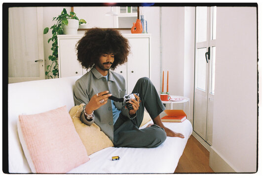 Capturing Moments in a Cozy Indoor Space With Vintage Camera
