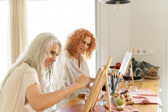 Women painting at home