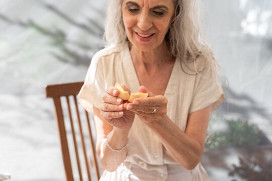 Opening fortune cookie
