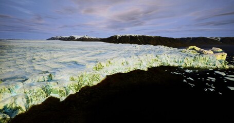 Expansive icy coastline under pastel sky, calm arctic morning with low sun casting soft light across fractured ice floes and distant shoreline, perfect travel © icetray