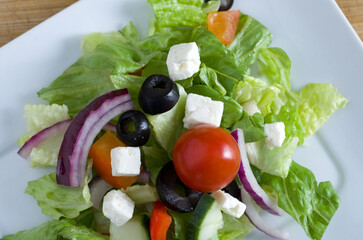 Top View of Beautiful Greek Salad made with Fresh Vegetables