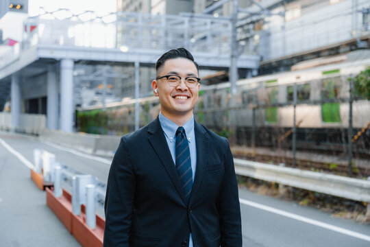 Portrait of a businessman on a city street