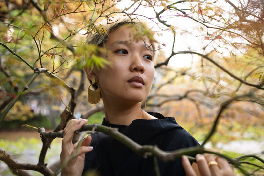 Standing Among Golden Foliage