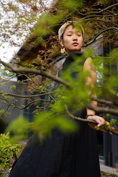 Standing Behind Autumn Leaves