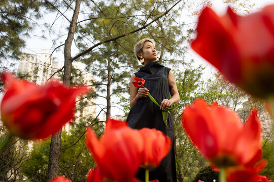 Standing in Bright Tulip Field