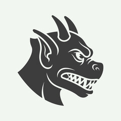 Obraz premium Stylized black and white illustration of a fierce, mythical creature's head.