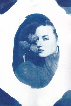Cyanotype of woman holding poppies near face