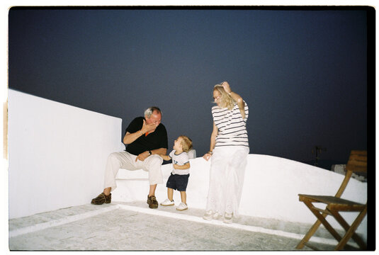 Grandparents With Child Rooftop