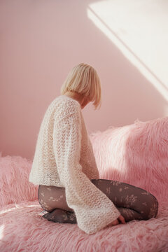 Cozy moment in soft pastel hues with stylish attire