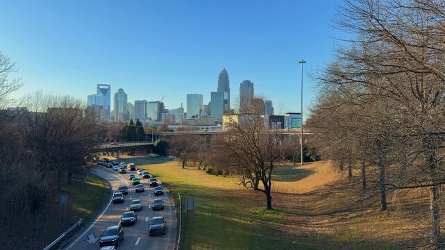View of the Charlotte, NC skyline from the Kings Drive Bridge overpass in the late afternoon sun