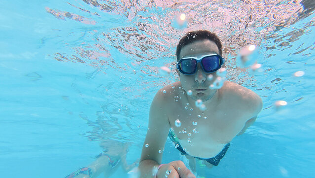 UGC Selfie of man swimming in the pool