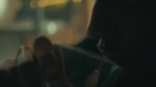 Boy drinks water in a gloomy atmosphere
