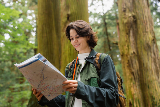  A tourist studies a map