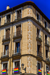 Obraz premium Beautiful traditional residential buildings with metal balconies in the streets of the city center in Madrid, Spain