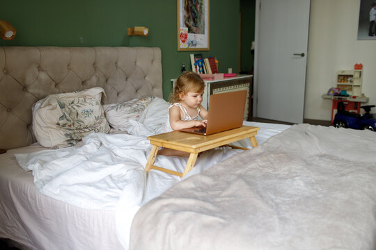 child watching cartoons on a tablet